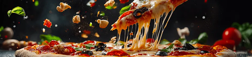A golden-brown calzone sliced open to reveal ricotta cheese and savory fillings, served with marinara dipping sauce at The Pizza Corner